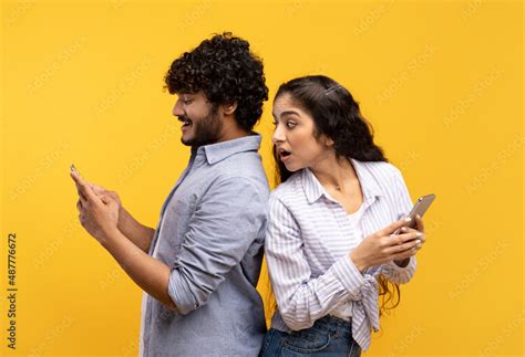Shocked Indian Woman Spying On Her Smiling Boyfriend Who Using