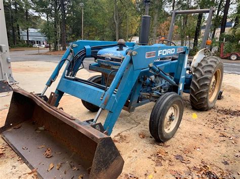 Ford 2810 Tractor With Front End Loader And 48 Finishing Mower Low