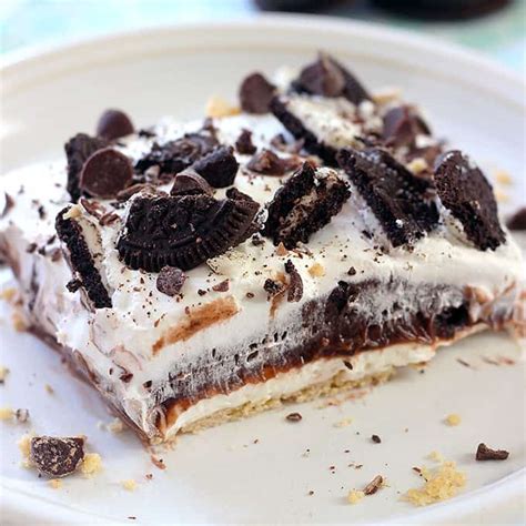 When it is too hot in the kitchen to cook, pull out this recipe to help keep your kitchen cool. Oreo Four Layer Dessert Recipe - Belle of the Kitchen