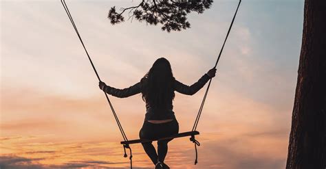 Silhouette Of Person Sitting On Swing During Sunset · Free Stock Photo