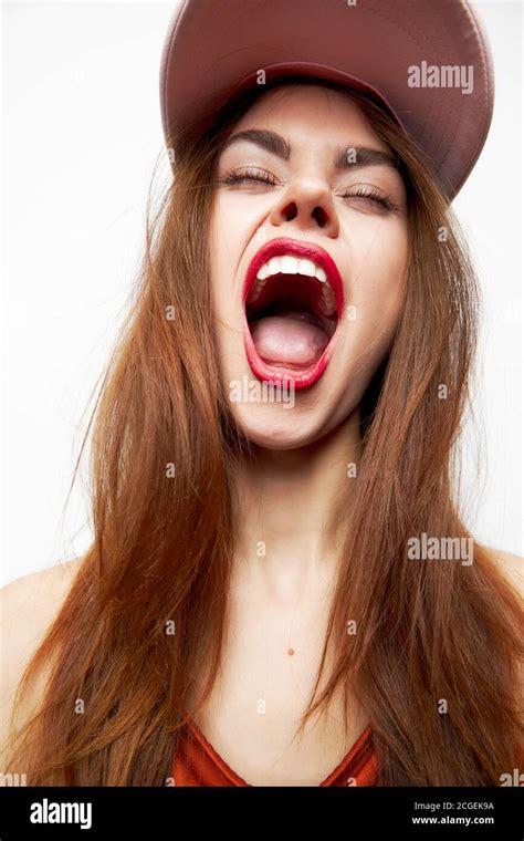 Woman With A Cap Model Wide Open Mouth Closed Eyes On Her Head Model