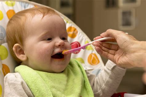 Happy Baby Girl Eating Porridge Stock Image Image Of Spoon Caring