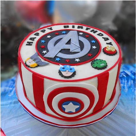 Cutting in to the cake for the. Avenger theme cake - My version of an Avenger cake picture ...