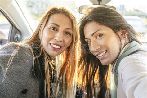 Two Latina Women Friends In A Car Seen From The Back Seat Stock Image Image Of Road Inside
