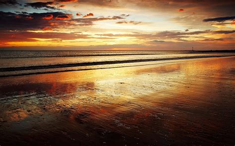 beautiful rust colored beach and sunset beach rust sunset clouds