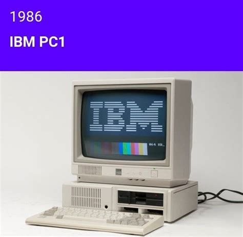 An Old Computer With The Ibm Logo On Its Screen And Keyboard Is Shown