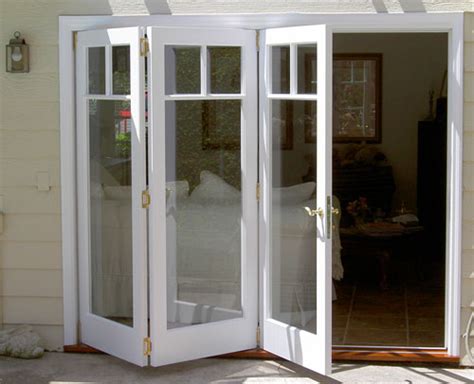 External bifold doors are glass panel doors that use a track system to slide and fold as they open. Window Door Photos | Folding patio doors, Bifold patio ...