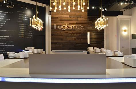 Metallic and silver reception desks. GLAMBAR-This is my favorite look. Distressed wall, metal ...