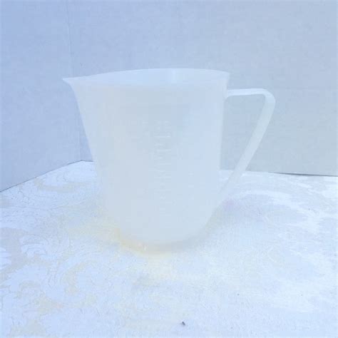 Vintage White Plastic Metric Measuring Cup By Action