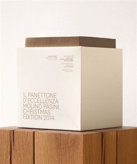 Panettone box on wooden stool | Panettone, Packaging, Natural wine