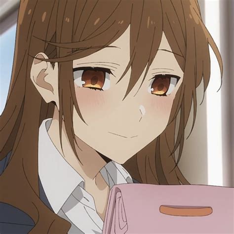 An Anime Girl With Long Brown Hair Holding A Pink Folder And Looking At