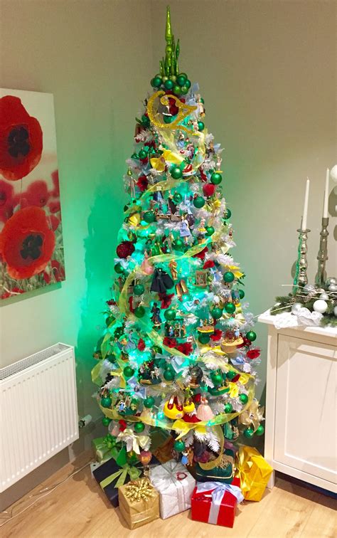 Wizard Of Oz Christmas Tree With Themed Ts Underneath Christmas