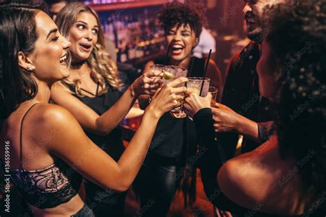 Group Of Friends Partying In A Nightclub Stock Photo Adobe Stock