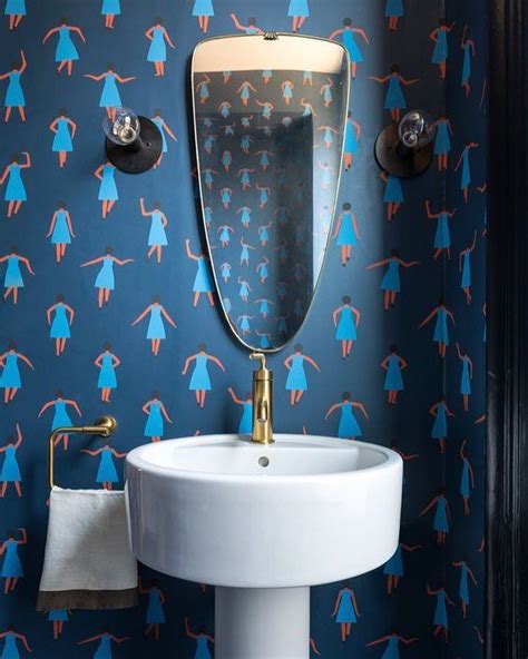 Sweet wall paper decpration of bathroom using blue as main color and