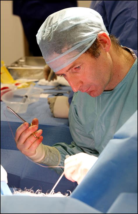 a urology surgeon performs an operation at the treatment centre at the chelsea and westminster