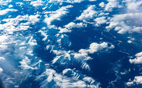 Download Wallpaper 1680x1050 Mountains Clouds Aerial View Height