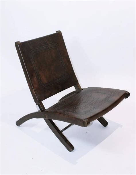 Don shoemaker mid century modern folding leather arm chair museum quality #2. Mid-Century Modern Tooled Leather Folding Lounge Chair ...