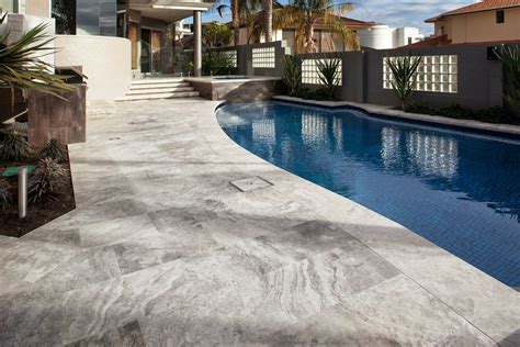 Stacked stone (msi silver travertine) installation gaps. silver-oyster-french-pattern-unfilled-tumbled-travertine-POOL