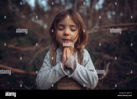 Cute Little Girl Praying Hi Res Stock Photography And Images Alamy