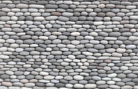 Background Wall Decorated With Smooth Stones Stock Image Image Of