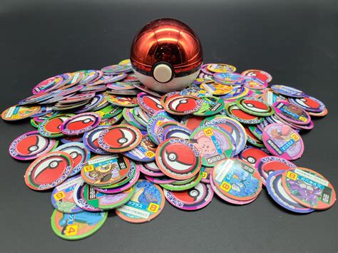 Urban Auctions Pokemon Pogs Pokeball With Gold Bar