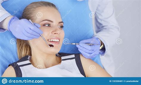 Beautiful Girl In The Dental Chair On The Examination At The Dentist Stock Image Image Of