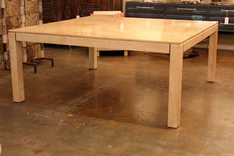 It catches the attention with the beautiful glass top. 6 ft Square Karl Springer Parchment Dining Table at 1stdibs