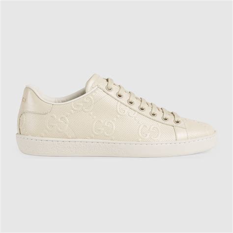 Womens Gg Embossed Ace Sneaker In White Leather Gucci Dk