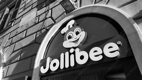 Sign Of A Roman Branch Of The Jollibee Fast Food Chain Filipino