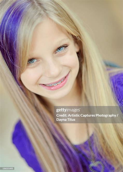 Young Girl With Purple Streak Hair High Res Stock Photo Getty Images