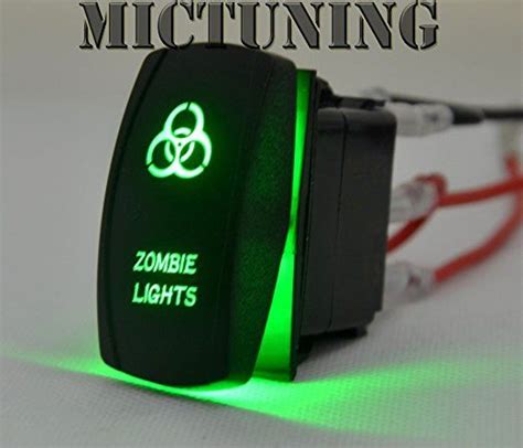 Problem is no matter how i seem to wire it i can't get the light to come and the unit to power on. Amazon.com: MICTUNING Laser Green ON-OFF Rocker Switch w/ Jumper Wire 5Pin 20 Amp 12 Volt LED ...