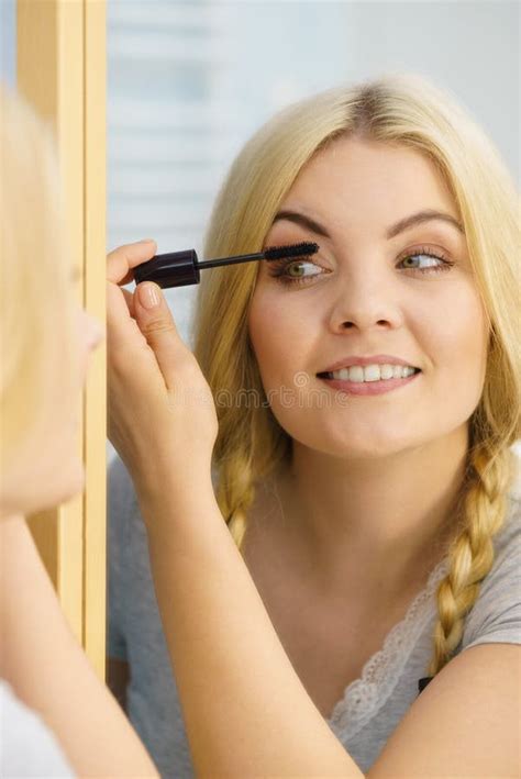 Woman Using Mascara On Her Eyelashes Stock Photo Image Of Beauty