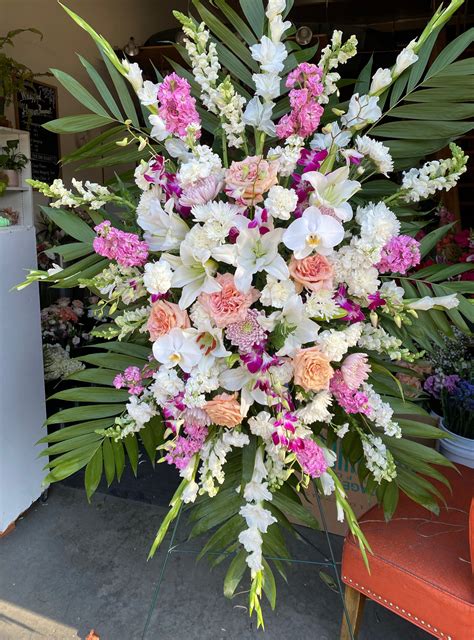 funeral standing spray pink hanadai florist