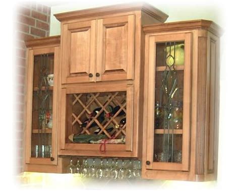 You can hold up to 28 full bottles of wine depending on the size of your cabinet space. wine rack cabinet | Lattice Wine Rack 1 | Wine rack cabinet, Cabinets and countertops, Wine rack