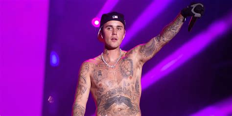 Justin Biebers Tattoos And Meanings Popsugar Beauty