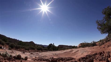 Blazing Sun on Desert Landscape Fisheye Stock Video Footage - Storyblocks