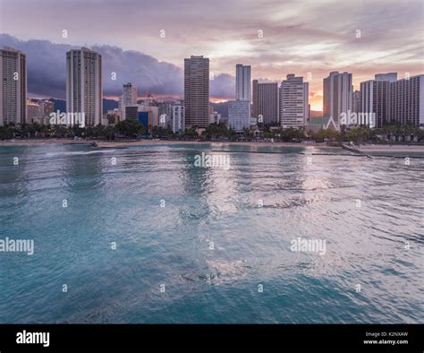 Aerial View Of The Waikiki Skyline Ocean And Beach During Sunrise