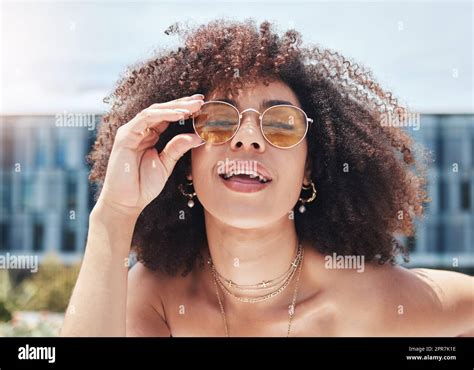 Young Mixed Race Woman With Curly Natural Afro Hair Wearing Trendy And