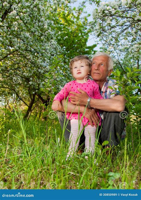 grandfather with his granddaughter stock image image of granddaughter cheerful 30850989