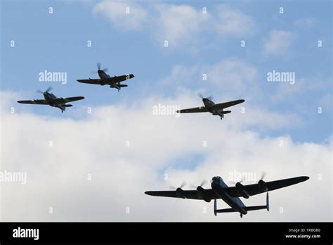 Lancaster Bomber 2 Hurricanes And A Spitfire Flying Formation Stock