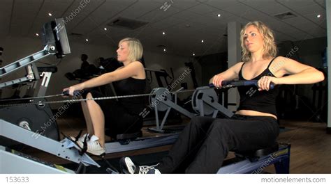 Beautiful Blonde Girls Enjoy Working Out At The Gym Stock Video Footage