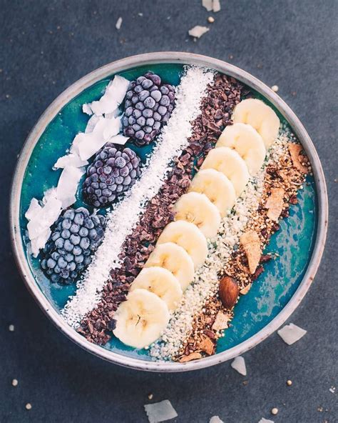 Blue Spirulina Bowl With Banana Coconut Blackberry And Coconut Nibs
