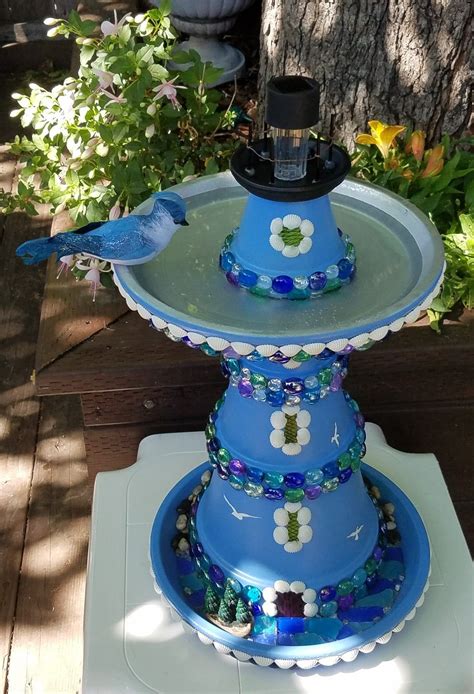 You can make your terracotta pot stand out from the others with a little bit of paint and creativity. Combination solar lighthouse birdbath I made with ...