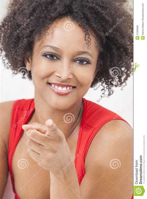 Happy Mixed Race African American Girl Pointing Stock
