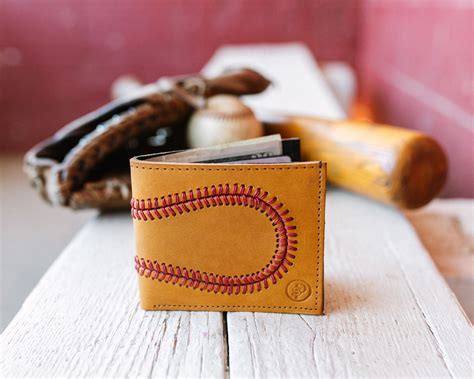 This article will feature a list of 6 best gifts that you can choose to give to any baseball fanatic in your life, as well as some 2. Brown Leather Baseball Wallet | Baseball boyfriend gifts ...