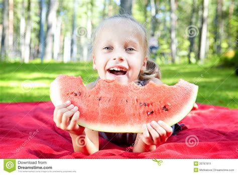 Funny Child Eating Watermelon In The Park Stock Image