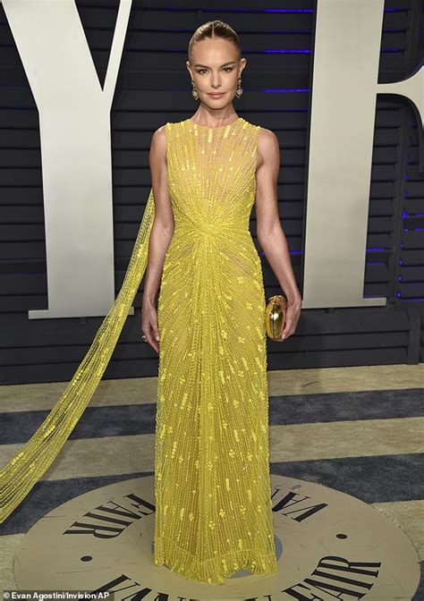 Kate Bosworth Sparkles In A Yellow Gown With A Dramatic Train At The Vanity Fair Oscars Party