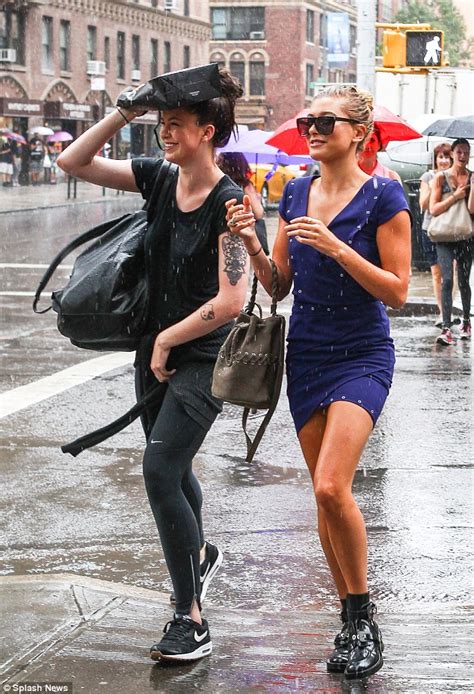 Ireland Baldwin Braless As Shes Caught In A Downpour With Hailey Baldwin In Ny Daily Mail Online