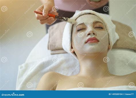 Beautiful Caucasian Woman Having Mask Lying On Spa Facial Treatment