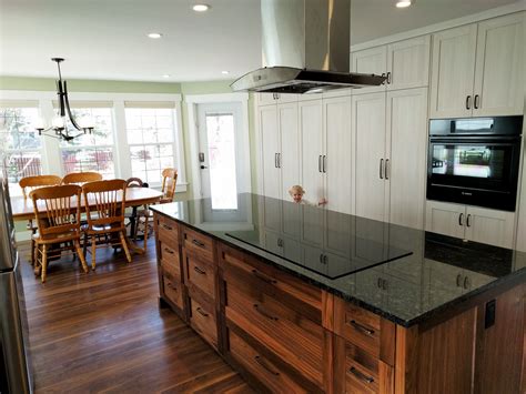 Walnut And Granite Island With A 36 Bosch Induction Cooktop Done By